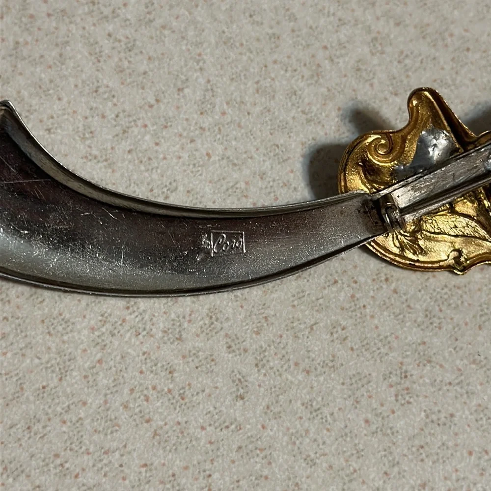 Coro gold tone and silver tone sword broach (541)